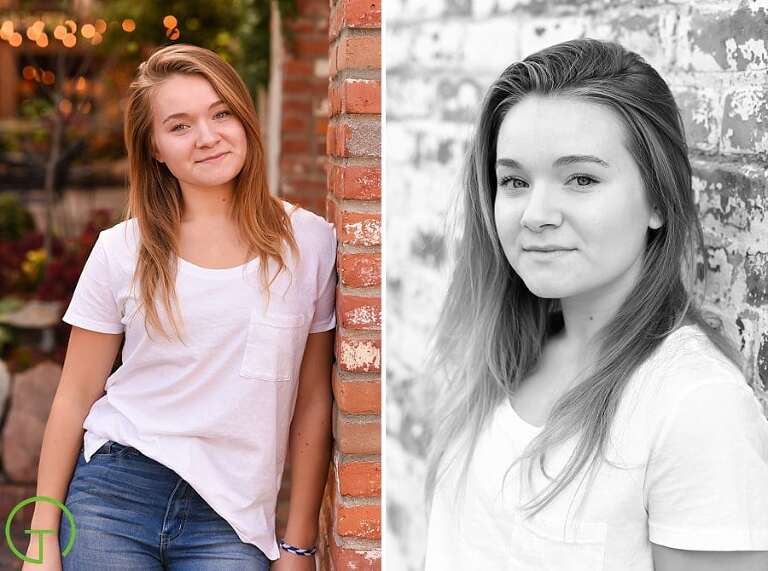 A high school senior poses near an old brick building in Ann Arbor's Kerrytown during her senior portrait session