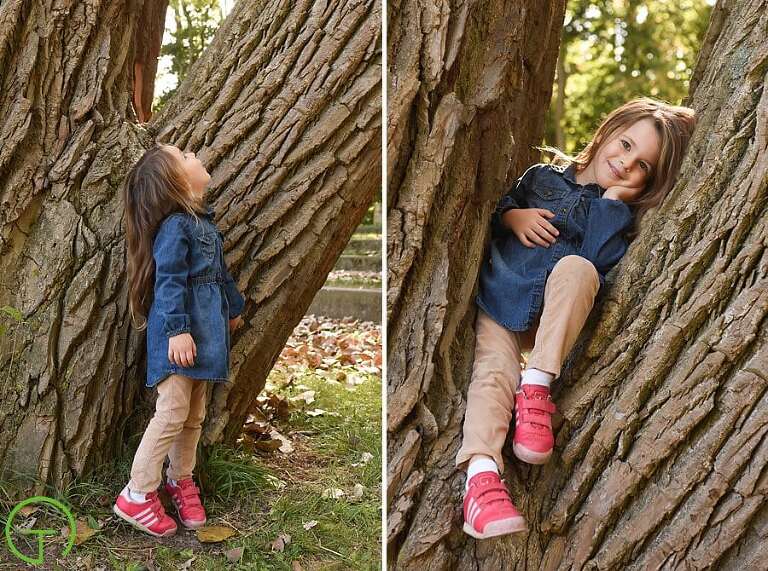 A young girl is in awe of the giant tree in Ypsilanti's Frog Island
