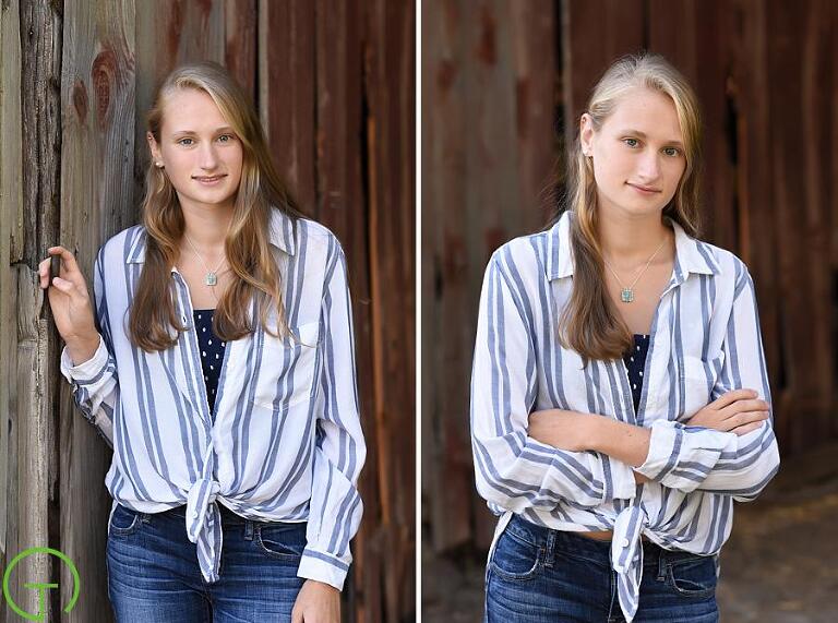 A high school senior poses near an old rustic barn for her Ypsilanti senior portrait session